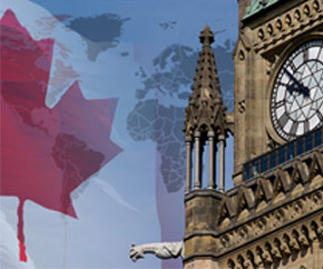 Tour de la paix avec un drapeau canadien et une carte du monde